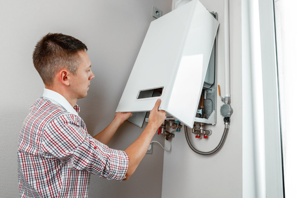 A professional technician installing a new water heater